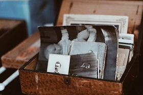 old black and white photographs in a lidded box