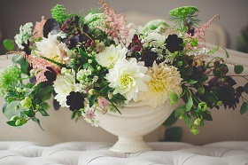 pink, white, and yellow flowers in white vase